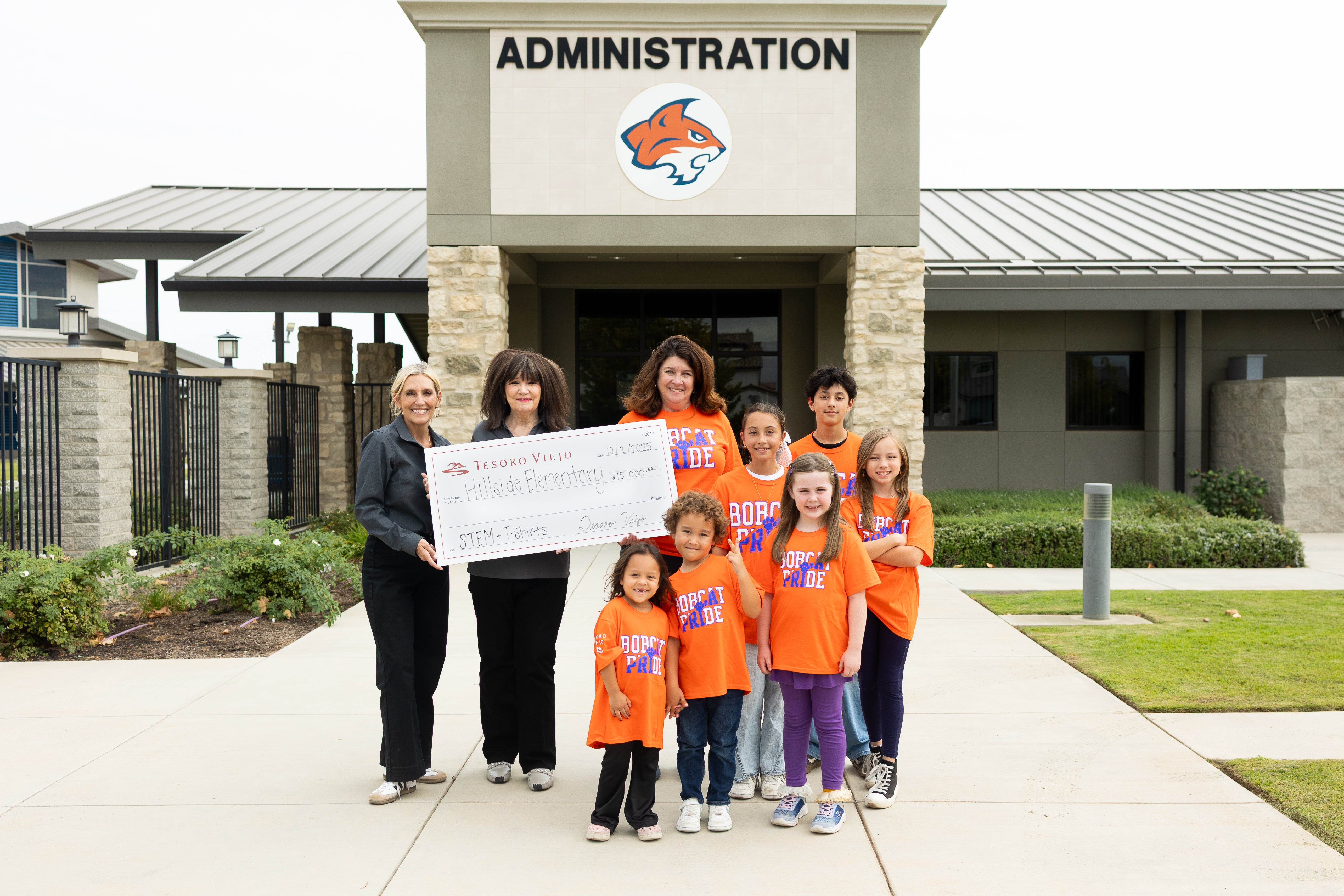 Karen McCaffrey, vice president of Tesoro Viejo, presents check to Hillside School Principal Kristi DeBernardi to support STEM learning.