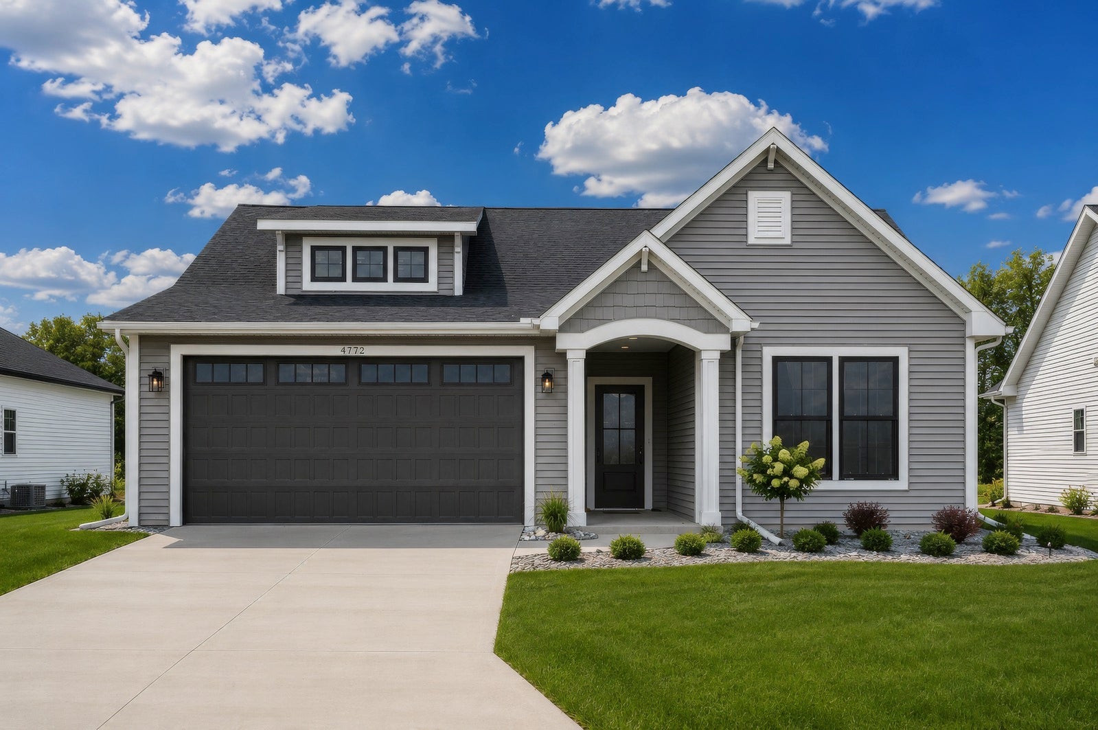 4772 Signature Drive, Bay City — zero-step entry home with covered porch